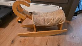 Schaukelpferd aus Holz mit Polstersitz gebraucht