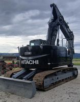 Bagger Hytachi 225 mit schilt und verstelausleger