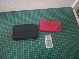 Nintendo DSi Red console with case and game