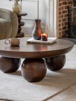 Runder Couchtisch Sculpt aus Mangoholz  CHF 899-50%