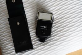 Minolta 132x Blitz + Hülle