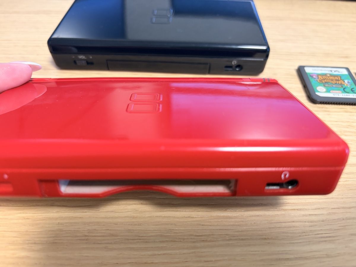 Nintendo Konsolen: Nintendo DS lite schwarz + rot mit 2 Spielen – Gebraucht aus Wangen b. Olten von na_wal 1