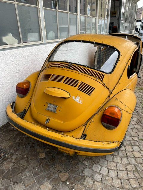 VW Tutti pezzi di ricambio auto: VW Käfer Hinterteil mit geschlitzter Motor Haube – Difettoso da Grenchen venduto da Woernerauto 1