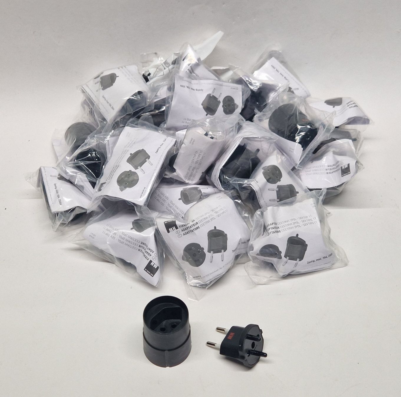 Unità & Adattatore: Fix Adapter CH EURO 2-Pol 5 Stück schwarz – Nuovo (secondo la descrizione) da Untersiggenthal venduto da Coca-Cola 1
