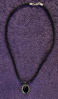 Kette mit schwarzem geflochtenem Band/Anhänger schwarz