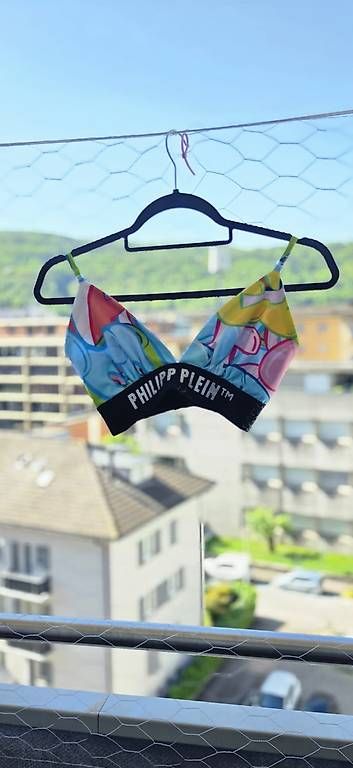 Top: Top/bra Philipp Plein multicolor  effetto graffiti – Usato da Chiasso venduto da AlissON