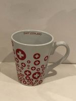 Tasse en porcelaine souvenir Suisse