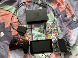 Nintendo Switch 1 mit Zubehör und Spielen