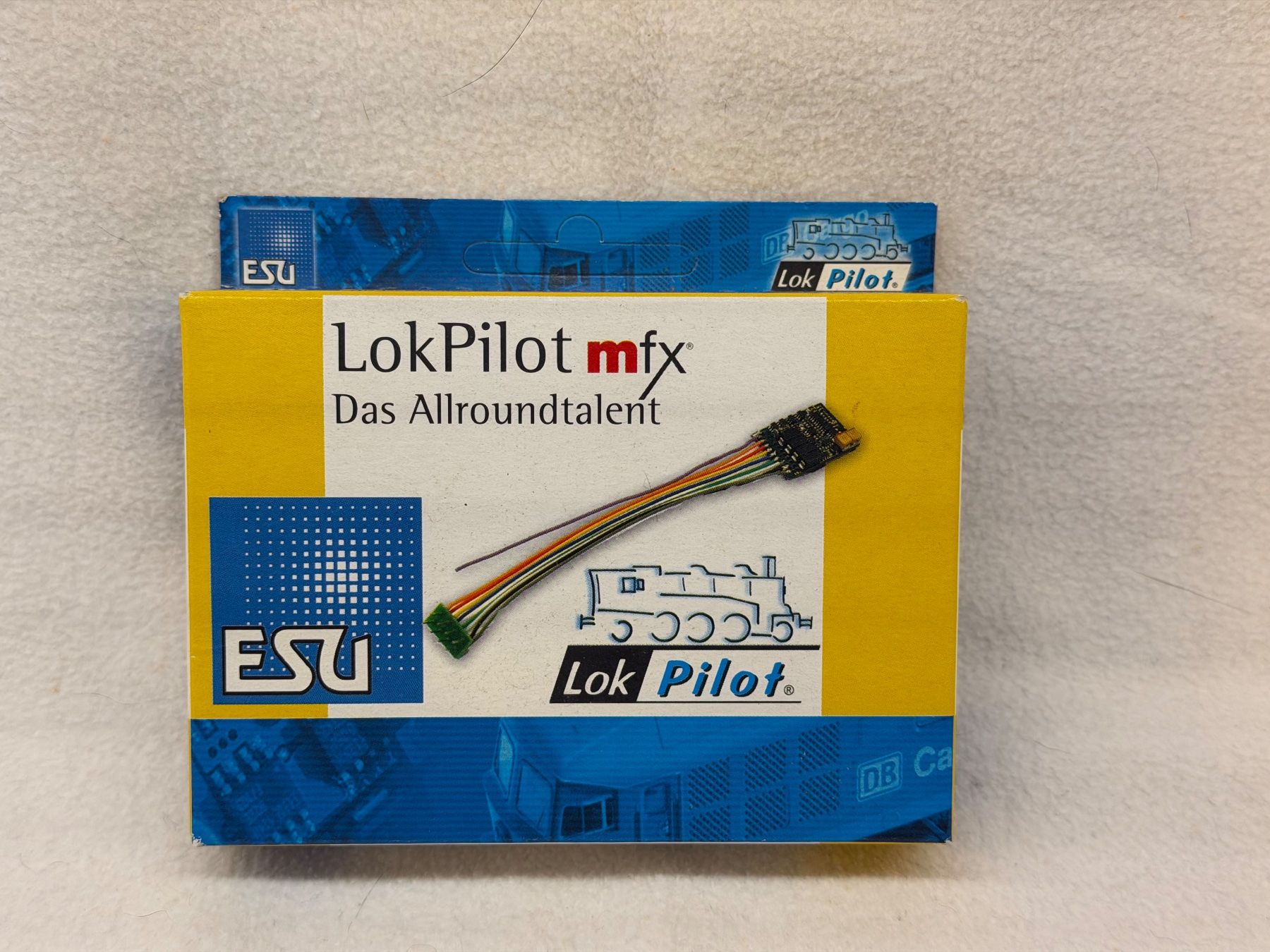 Esu Modellini di ferrovie: ESU LokPilot mfx Decoder 61600 ungeöffnet – Nuovo e nell'imballaggio originale da Betschwanden venduto da Miau