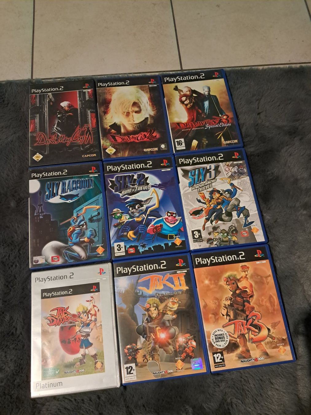 Spiele: PS2,   SLY 1,2 3.  JAK 1,2,3.   DEVIL MAY CRY 1,2,3 – Gebraucht aus Itingen von AnTiNoRmAl