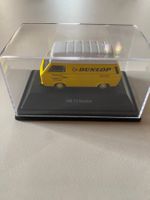 Gelber Dunlop VW T3 Kasten Bus Massstab 1/87 Marke Schuco