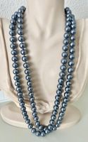 Perlen ohne Ende: Muschelkernperlen-Kette 146cm Handgeknüpft