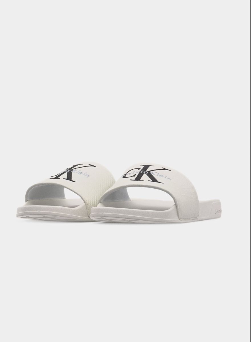 Calvin Klein Scarpe da uomo: Calvin Klein Mules - triple bright white pointure 41 – Nuovo e nell'imballaggio originale da Urtenen-Schönbühl venduto da Big.sanad 1