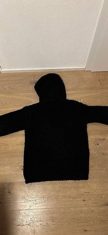 schwarzee flauschiger Hoddie unisex 2