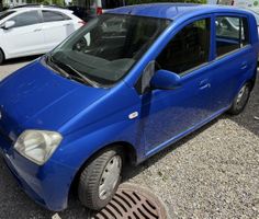 Daihatsu Cuore Limousine Blau Met. 43kW 2005, 