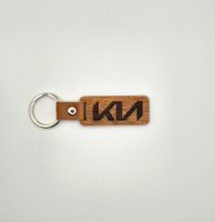 Kia Fanartikel: Holz Schlüsselanhänger mit Logo