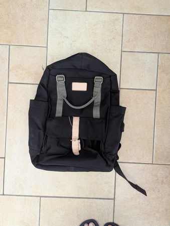 Nordace Backpack with sign of use with USB charging port