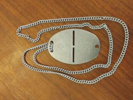 "Grabstein" Erkennungsmarke Schweizer Militär (*1961)