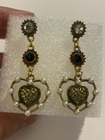 Très jolies boucles d’oreilles cuivrées vintage neuves