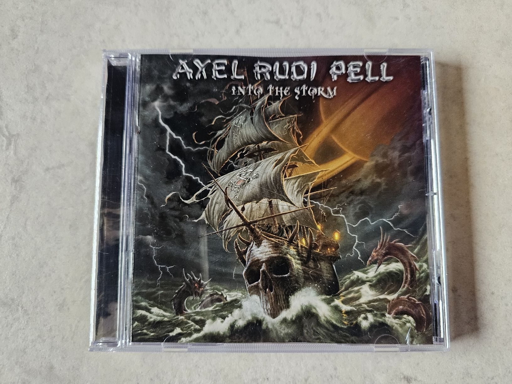 CD: Axel Rudi Pell  -  Into The Storm – Usato da Schneisingen venduto da backstore24