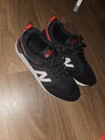 New Balance 009 - Baskets noires et rouges