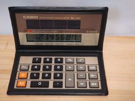 Calculatrice solaire vintage Casio SL-100, 8 chiffres.