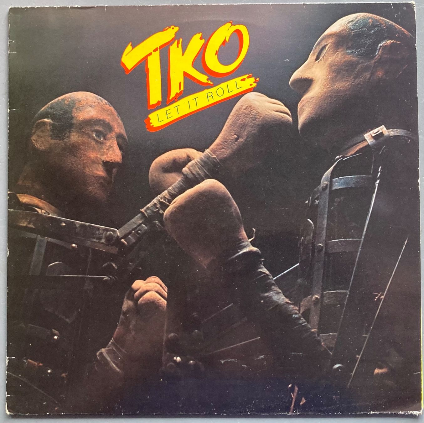 Dischi in vinile: TKO - LET IT ROLL – Usato da Poliez-Pittet venduto da Newtown-Records