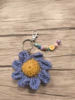 Porte-clés / charm sac fleur en crochet avec perles