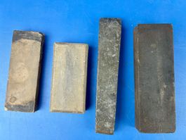 4 antike Schleifsteine, grösster ist 17 cm.