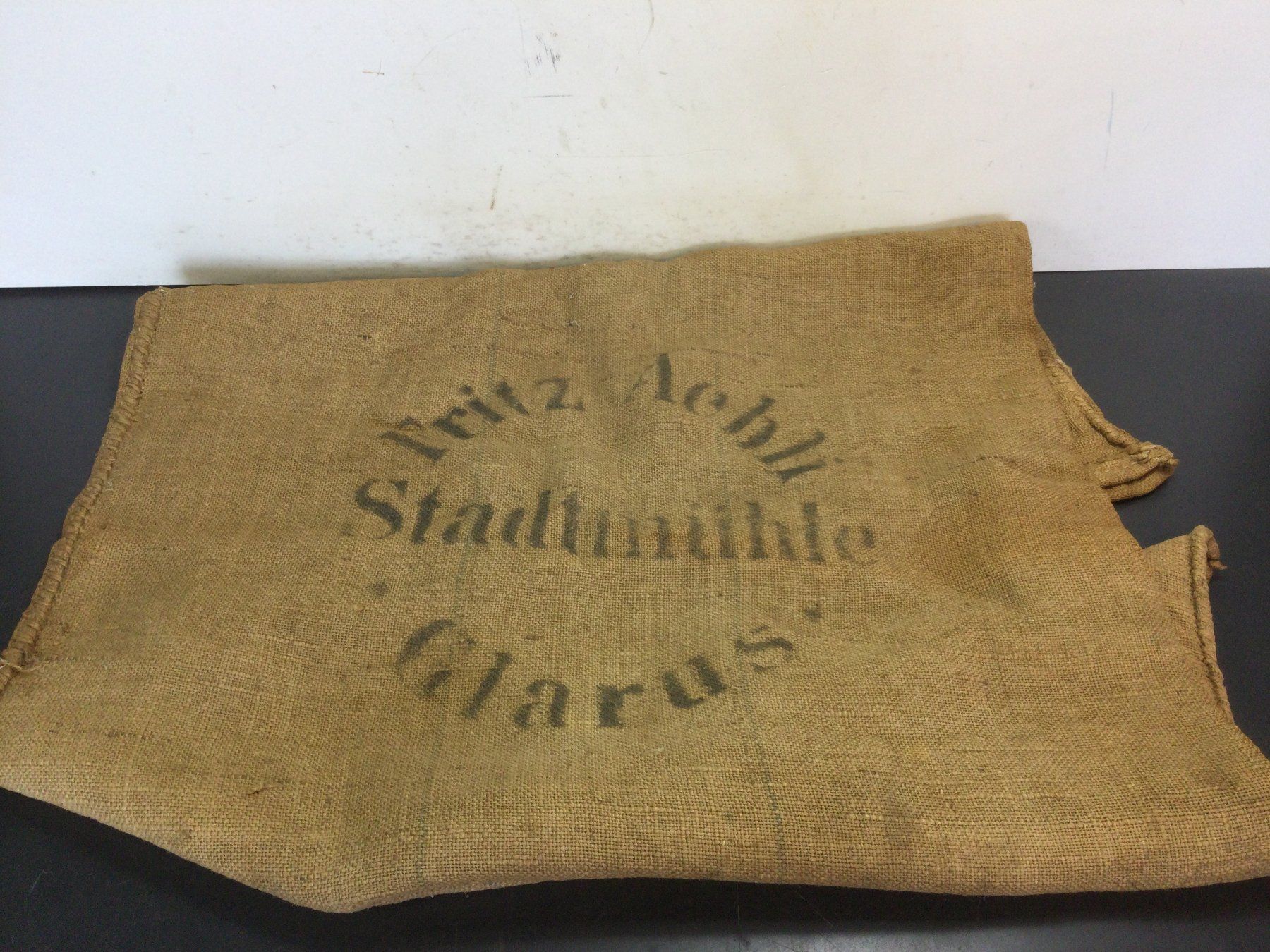 Attrezzi da lavoro: Alter Jutesack Stadtmühle Glarus Fritz Aebli – Usato da Wangen SZ venduto da kuriosum12