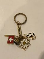 Porte-clés souvenir Suisse drapeau, vache, edelweiss, cloche