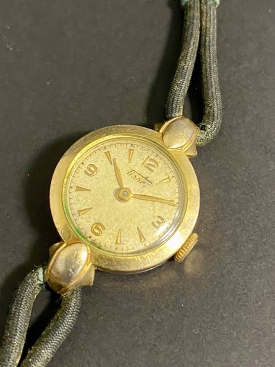 Montre ancienne femme tissot best sale or jaune