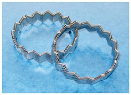 2 Ärmelraffer, elastisch (Modeschmuck) Metall