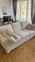 Sofa mit Ausziehfunktion und einem neuen grauen Bezug