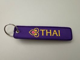 Schlüsselanhänger Thai Airways lila Stoff neuwertig