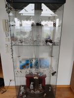 Div. Swarovski Figuren mit Vitrine