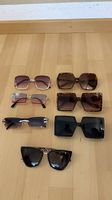 Sonnenbrille, Handtasche, Gürtel