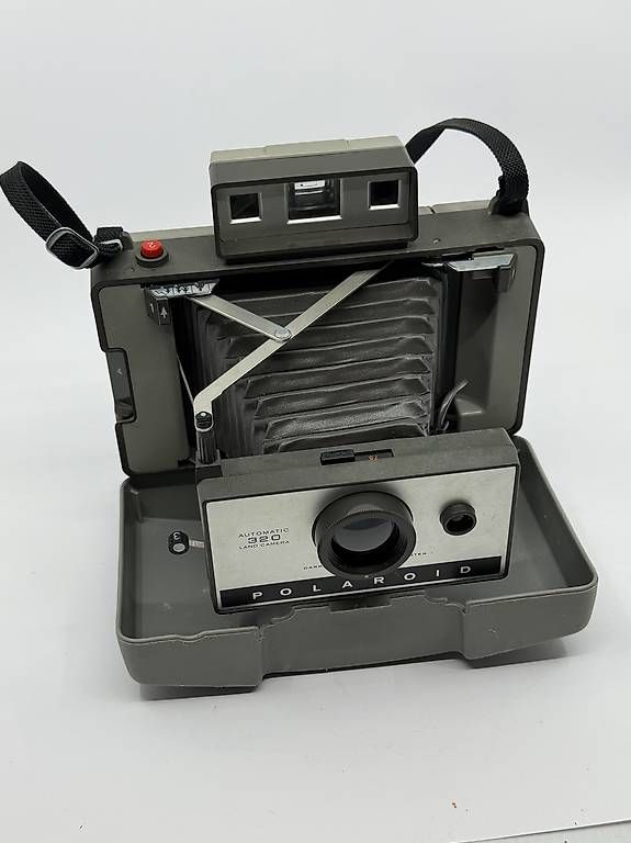 Polaroid Fotocamera: Polaroid Sofortbildkamera, automatic 320 Land Camera – Usato da Biel/Bienne venduto da hausamgern