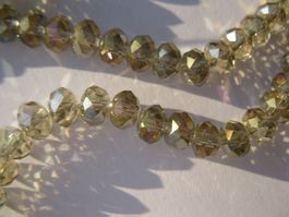 1 Strang Glasperlen 6x4mm champagner AB