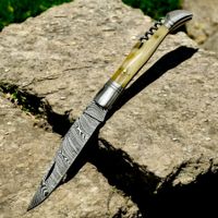 Couteau pliant lame acier Damas et manche en corne