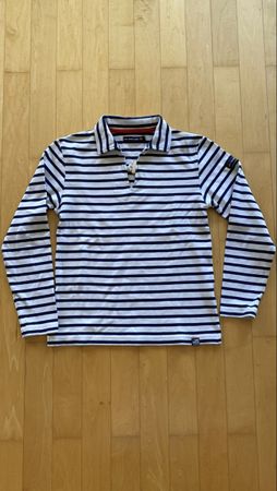 Long sleeved navy blue and white polo