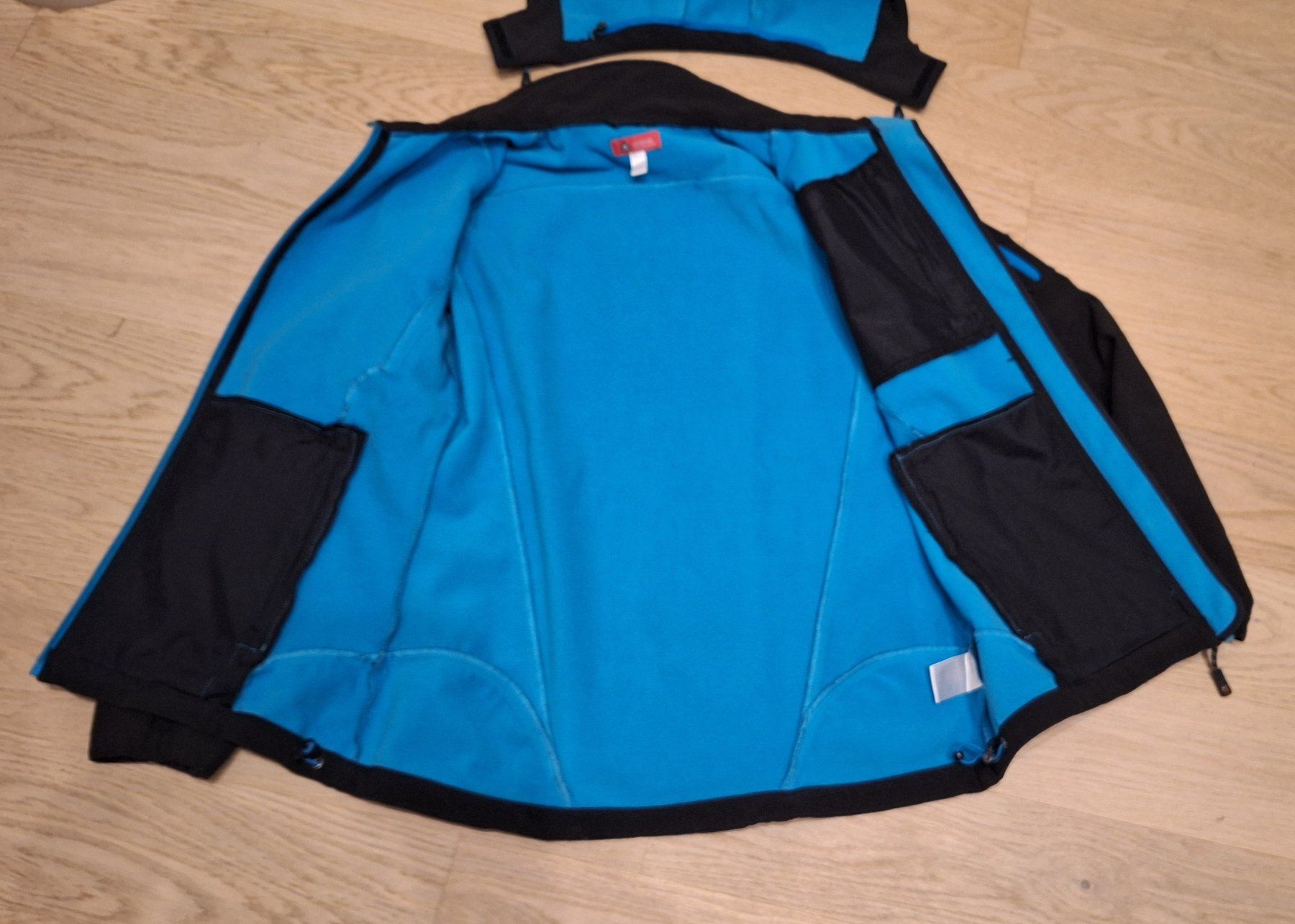 Giacche: Softshelljacke OCK Gr. 38 schwarz/türkis – Usato da Niederrohrdorf venduto da Papillon_47 2
