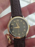 Montre automatique Universal Genève lunette or 18k 35mm