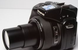 OLYMPUS SP 570 UZ Digitalkamera mit 20x optischem Ultrazoon