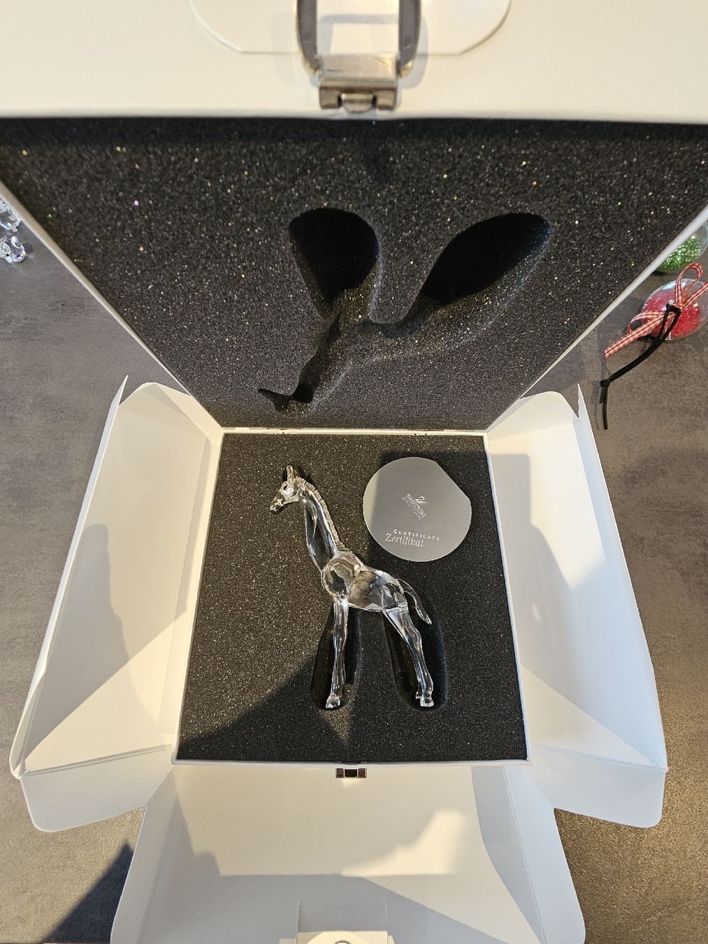 Swarovski Figuren: Swarovski Babygiraffe 236717 – Neu und originalverpackt aus Roggwil BE von val_cqv7