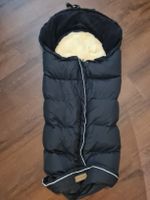 Fusssack schwarz gefüttert mit Merino Lammfell von Fillikid
