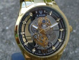 HERREN UHR TOP DESGIN MIT WAU EFFEKT EIN TRAUM !