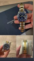 Rolex Submariner Date 41mm Stahl Gold Blue guter Zustand