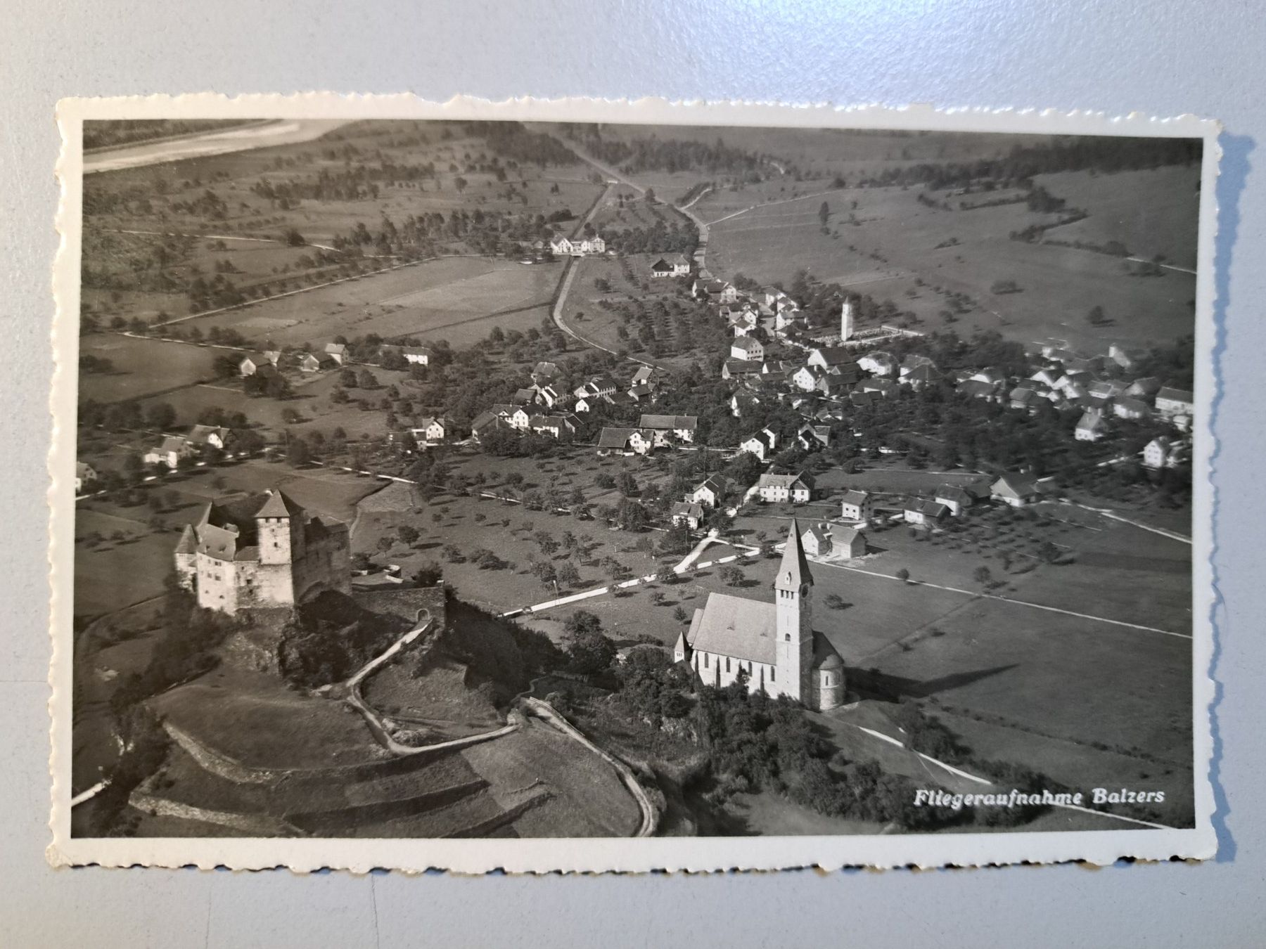 Cartoline postali: AK Balzers Fliegeraufnahme – Usato da Kirchberg BE venduto da Soldino