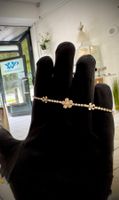 Elegantes Goldarmband mit Zirkonia-Blumen
